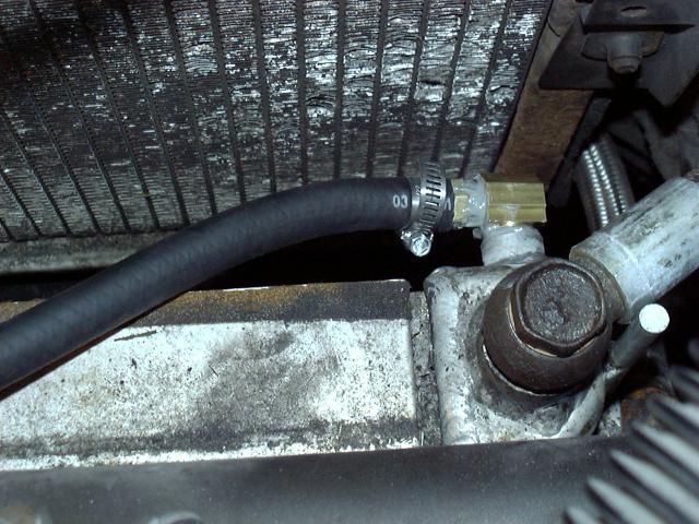 Oil hose connected to oil cooler