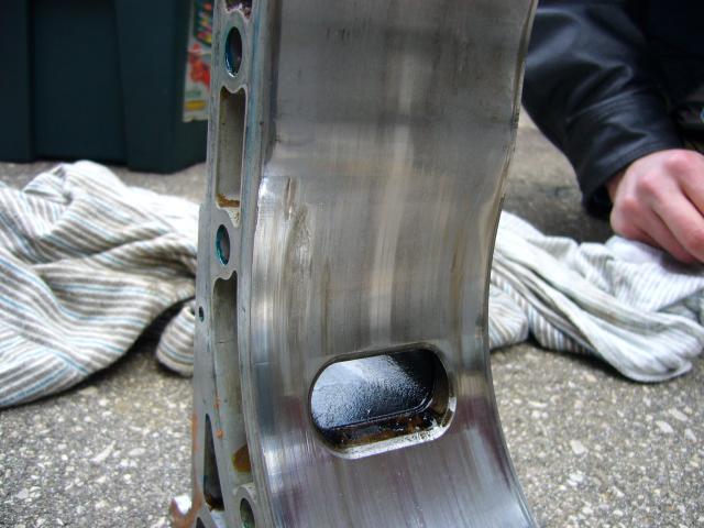 Major score marks on inside of rotor housing due to corner seal