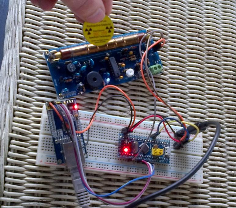 Image of RH Electronics Arduino compatible geiger counter connected to STM32 Blue Pill on breadboard with Wiznet ethernet module