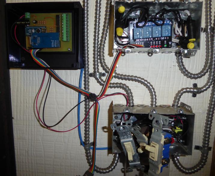 Image of Nano board mounted on shop wall, connected to relays