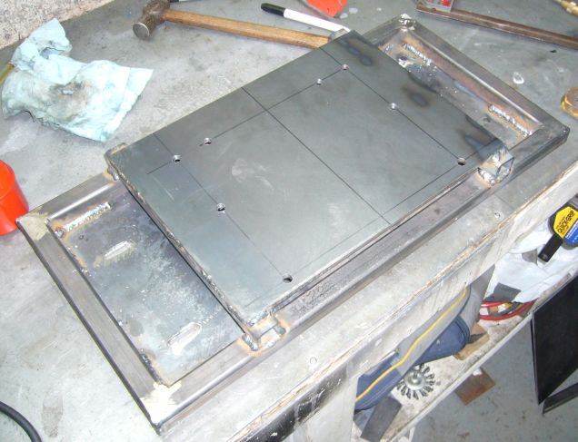 Tank mounting plate welded in place