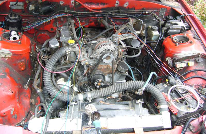 Megasquirt wires being run in TII engine bay